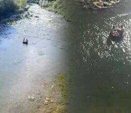 Traktör şambreli ile rafting yaptılar