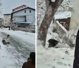 Poşetle kayan gençler hızını alamayarak bahçeye uçtu