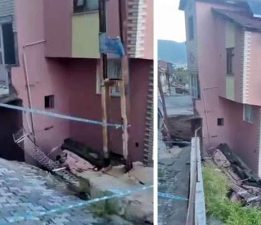 Çöken istinat duvarı binada hasar oluşturdu
